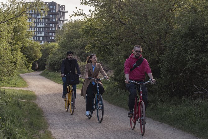 Copenhagen Architecture and Sustainability Tour with local Guide - Folkehuset Absalon and Kødbyen: reuse, religion-to-community, and industrial planning