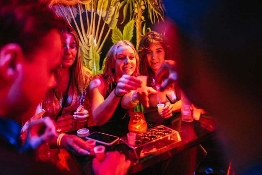 Copenhagen: Guided Party Pub Crawl with 4 Shots and 1 Drink - Weekdays vs Weekends: Where the Night Ends by Tivoli