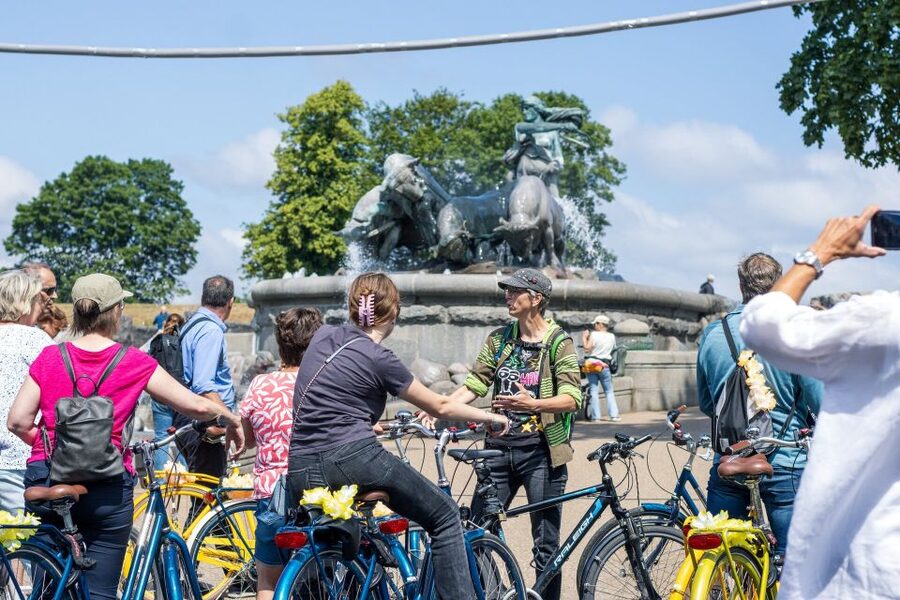 Copenhagen: Highlights 3 Hour Bike Tour with a Local Guide - Getting set up right: bikes, helmets, ponchos, and that comfy pre-ride lounge