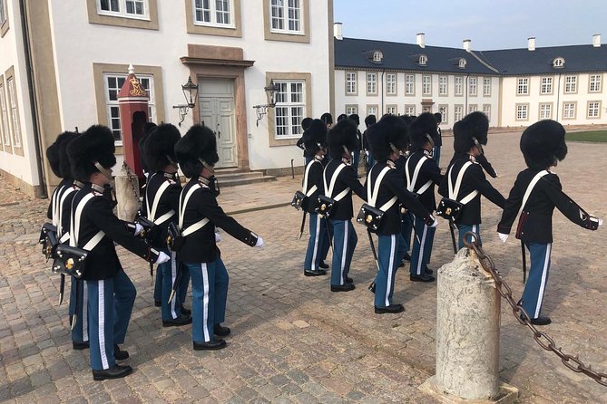 Copenhagen Walking Tour with Food Testing (smorrebrod dish & snap) - Christiansborg Slot to Nyhavn: royals and a canal postcard