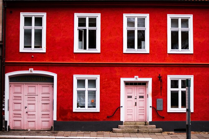 Explore Malmo in 60 minutes with a Local - Town Hall, Charles X sculpture, and St. Peter’s Church
